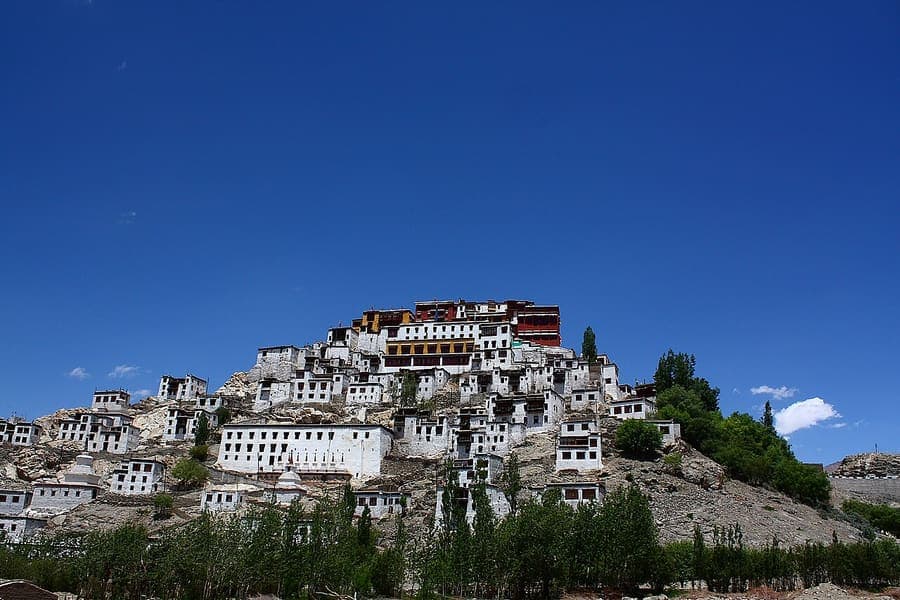 Thiksey Monastery, Leh Ladakh — Twelve tiers of whitewashed gompa above the Indus.