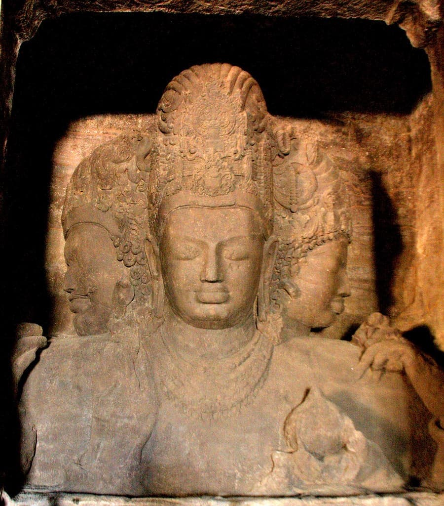 Elephanta Caves, Maharashtra Heritage — The three-headed Shiva, on an island off Mumbai.