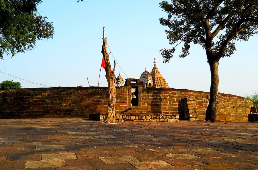 Chausath Yogini Temple, Narmada Parikrama — Sixty-four yoginis above the marble rocks.