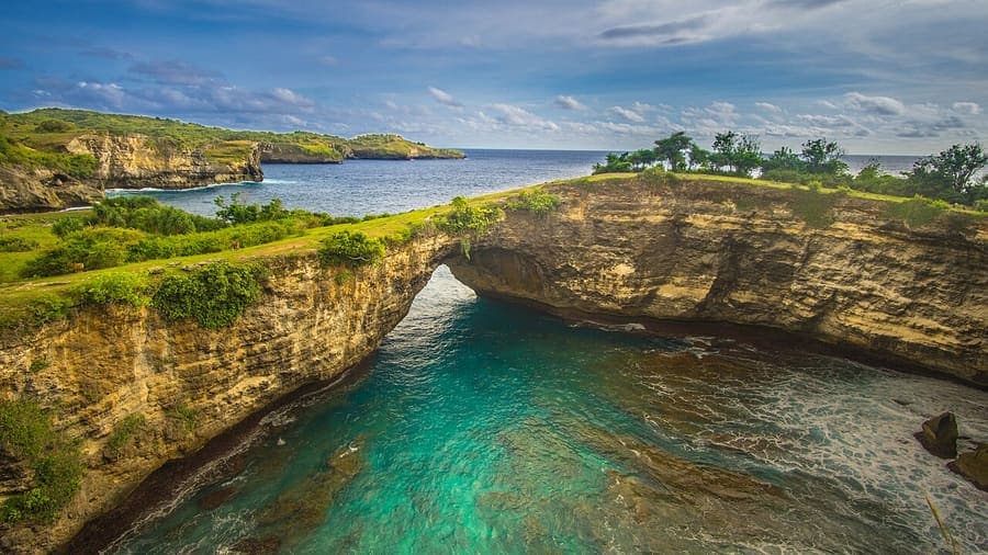 Nusa Penida, Bali — Kelingking cliff and impossible blue water.