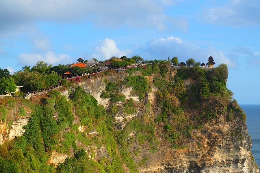 Uluwatu Temple, Bali — Clifftop shrine, kecak dance at sunset.