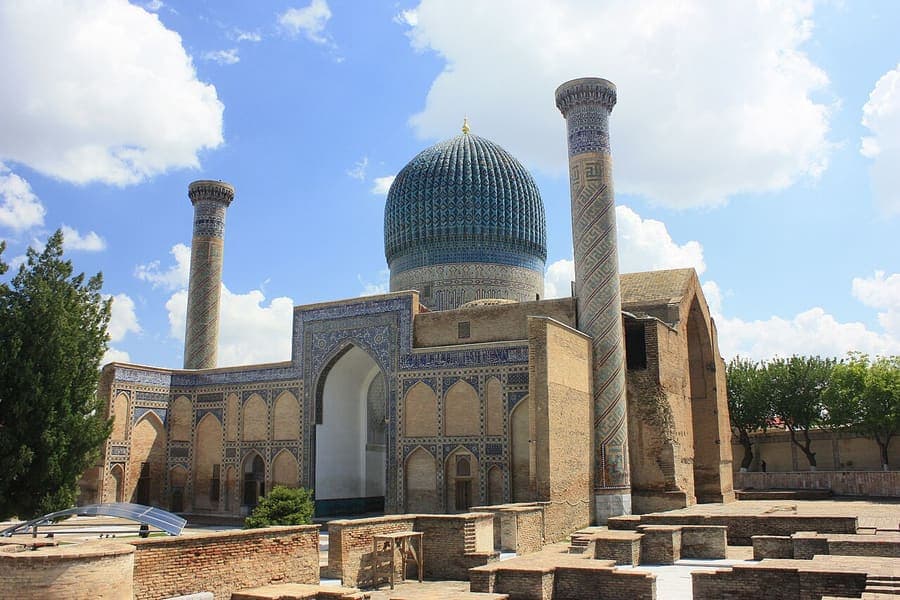 Gur-e-Amir, Uzbekistan — Timur's tomb under a fluted blue dome.
