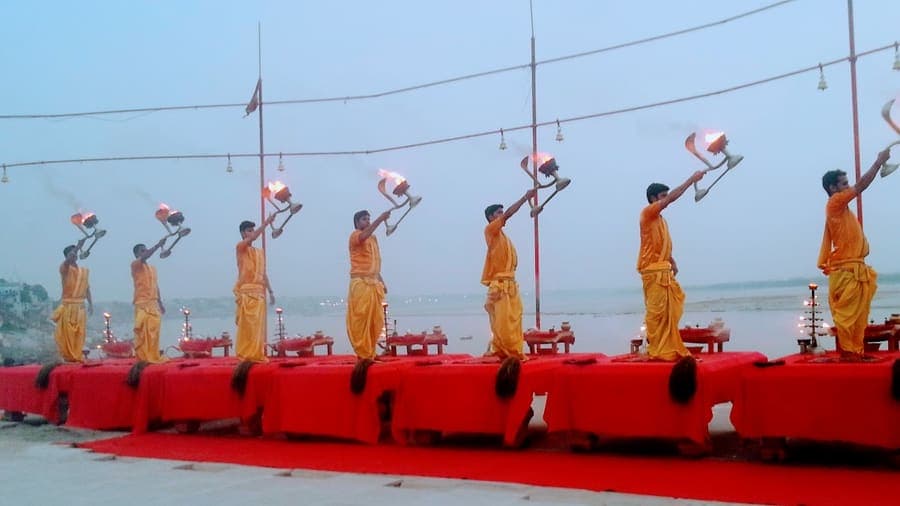 Assi Ghat, Varanasi — Morning yoga and the day's first boats.
