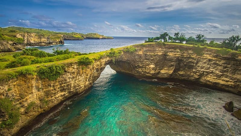 Nusa Penida, Bali — Kelingking cliff and impossible blue water.