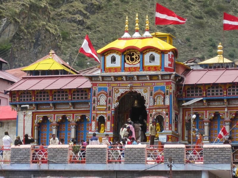 Badrinath Temple, Char Dham — Vishnu's Himalayan seat, painted and bright.